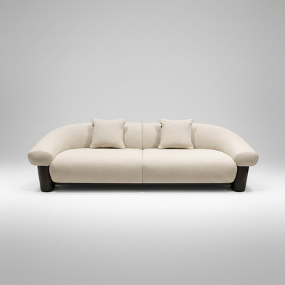 Beige sofa with dark wooden legs on a gray background