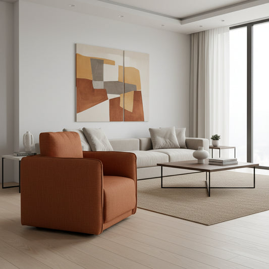 Brown armchair in a room with a striped wall, plant, and small table with books.