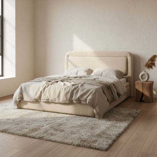 Beige upholstered bed with headboard on a white background