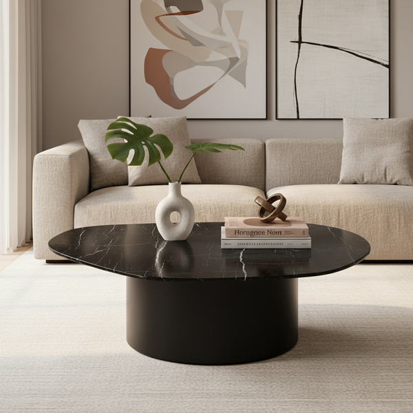 Round coffee table with marble top and black base on a white background