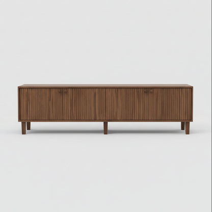 Modern living room with a wooden sideboard, armchair, and decorative items.